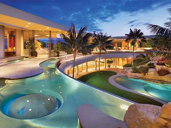 Resort pool, lit for the evening — We Fix Ugly Pools, the Valley of the Sun