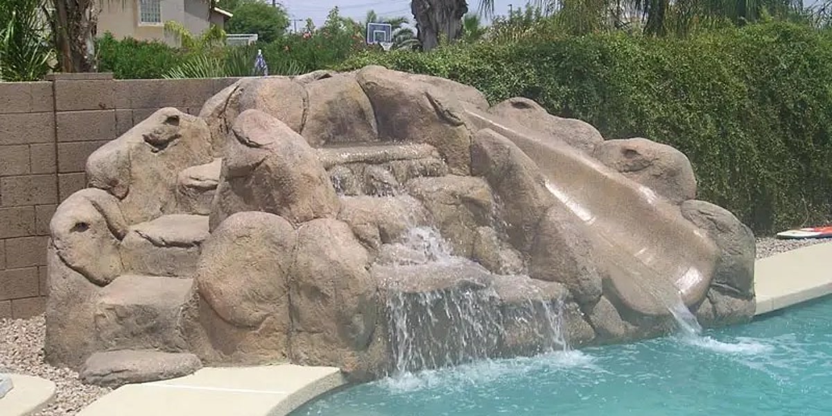 Rock grotto and waterfall — We Fix Ugly Pools, the Valley of the Sun